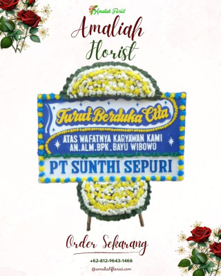 Papan Bunga Duka di Topiyai