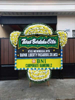 Papan Bunga Duka di Topiyai