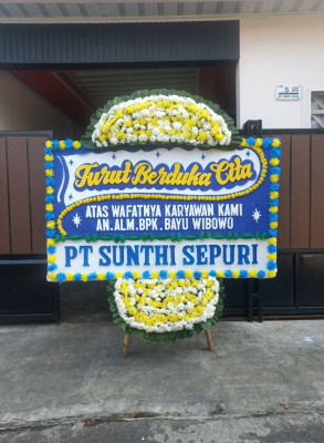 Papan Bunga Duka di Topiyai